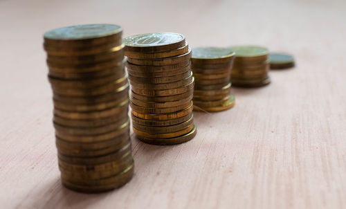 Close-up of coins on table