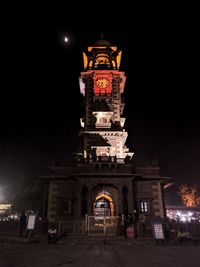 Low angle view of statue at night