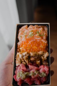 Close-up of hand holding food