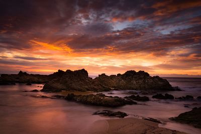 Scenic view of sea against sky during sunset