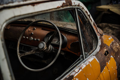 Abandoned car parked outdoors