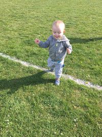 High angle view of boy on playing field