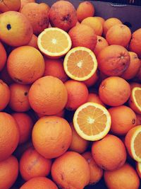 Full frame shot of orange fruits for sale at market