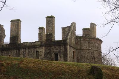 Low angle view of historic building against sky