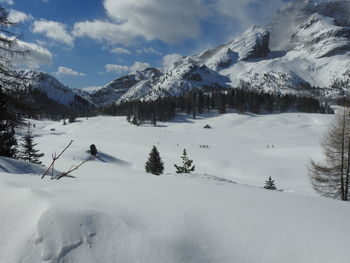 Scenic view of snowcapped mountains against sky