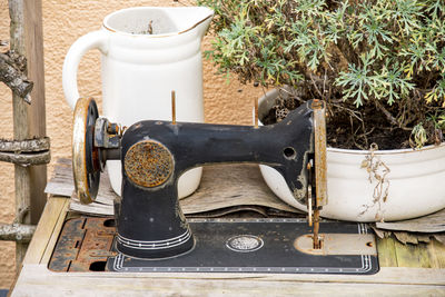 High angle view of old wooden table in yard