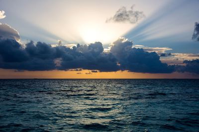 View of calm sea at sunset