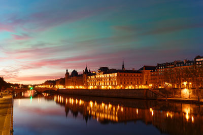 Illuminated buildings in water