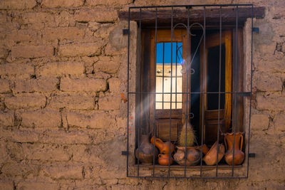 Close-up of window on wall of building