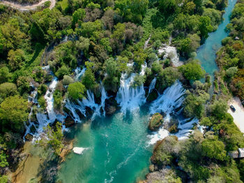 High angle view of waterfall in forest