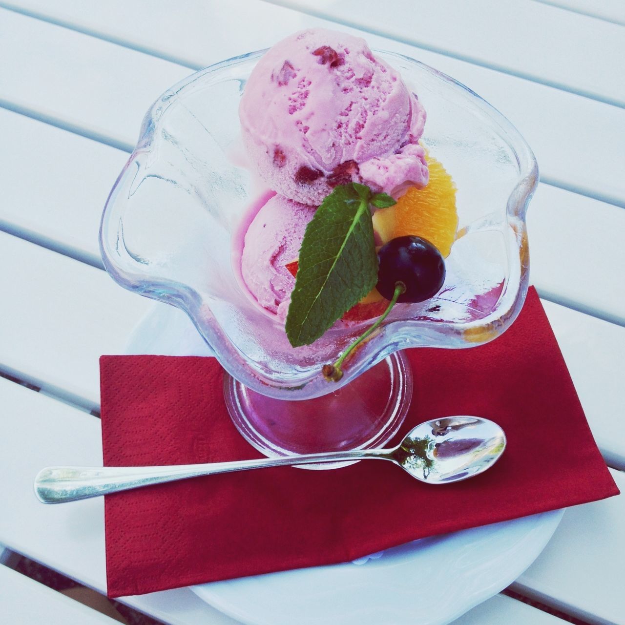 freshness, indoors, food and drink, table, still life, food, sweet food, high angle view, plate, close-up, ready-to-eat, dessert, fork, indulgence, flower, spoon, no people, strawberry, red, healthy eating