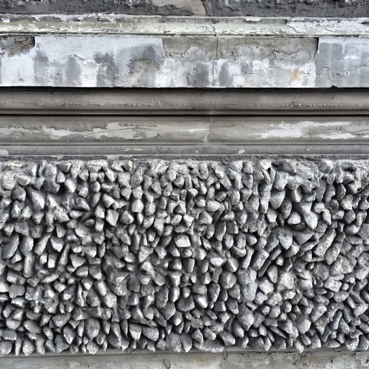 stone - object, large group of objects, abundance, railroad track, textured, full frame, stack, backgrounds, metal, wall - building feature, outdoors, stone wall, day, brick wall, pattern, pebble, no people, old, stone, gravel