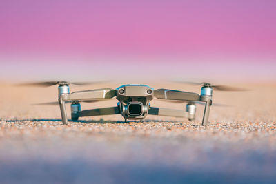 Close-up of drone against sky