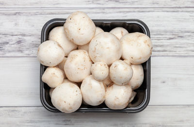 High angle view of eggs in container on table