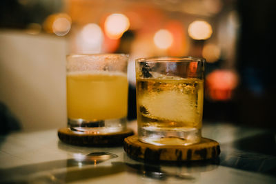 Close-up of beer glass on table