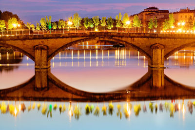 Arch bridge over river