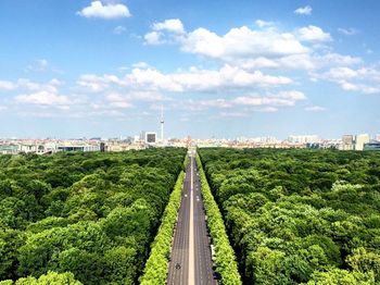 Aerial view of road against sky in city