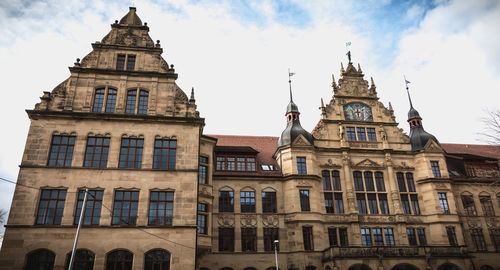 Low angle view of buildings against sky