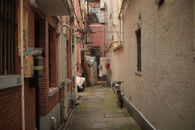 Narrow alley along buildings