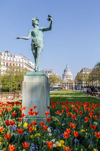 Statue of flowers in city