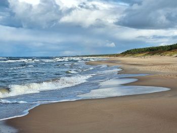 Scenic view of beach against sky