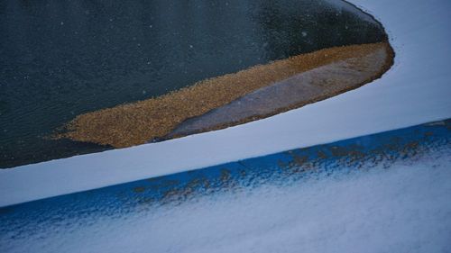 High angle view of snow on road