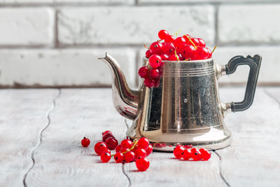 Close-up of red berries on table