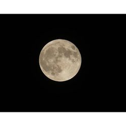 Low angle view of moon in sky