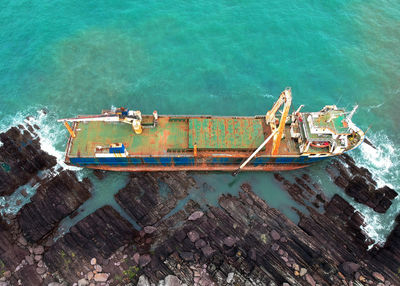 High angle view of shipwreck in sea