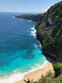 High angle view of sea shore against sky