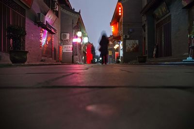 Illuminated street at night