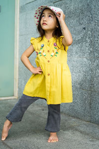 Beautiful little gorgeus lovely girl in summer look clothes, fashion dress, hat. child in outdoor.