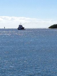 Boats sailing in sea