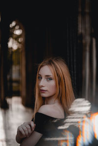 Portrait of woman standing outdoors