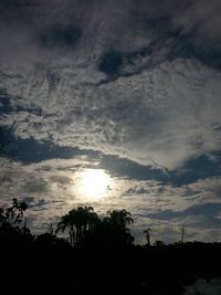 Scenic view of landscape against cloudy sky