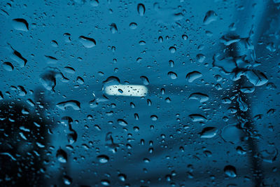 Close-up view of the raindrops on the windshield