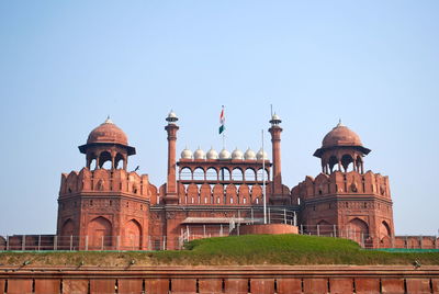 High section of red fort against clear sky