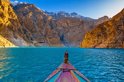 Scenic view of mountains against blue sky