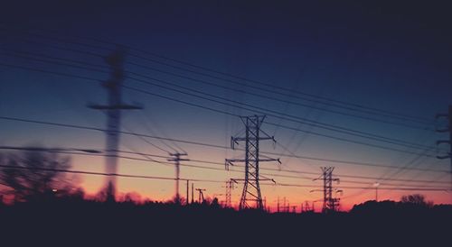 Electricity pylon at sunset