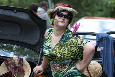 Woman sitting in car