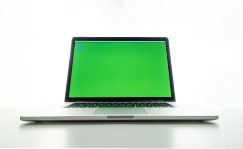 Low angle view of laptop on white background