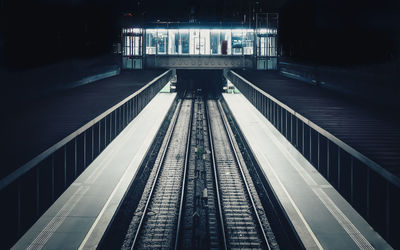 High angle view of railroad tracks at night