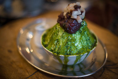 High angle view of ice cream in plate on table