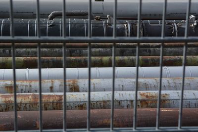 Metal grate in cage