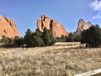 Panoramic shot of rocks on land against sky