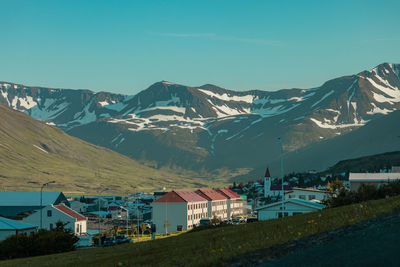 Scenic view of snowcapped mountains against clear sky