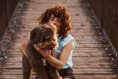 Portrait of woman with dog