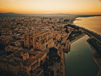 High angle view of city during sunset