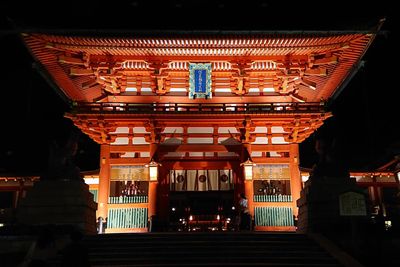 Low angle view of illuminated building at night