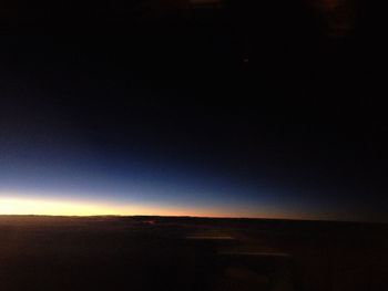 Scenic view of desert against sky at night